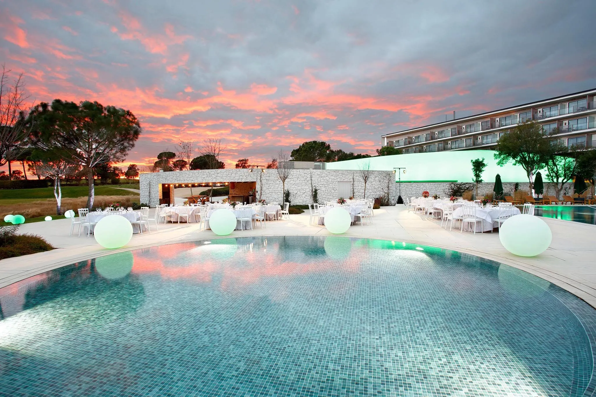 Camiral Golf and Wellness at PGA Catalunya Hotel Pool by Night
